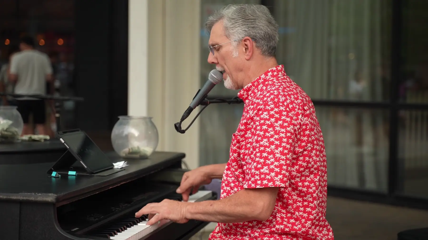 A live audience participating in a Midwest Dueling Pianos show